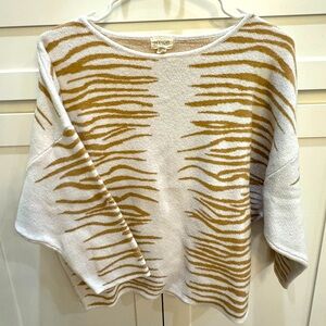 Super soft cream and camel sweater. 3/4 length sleeves.